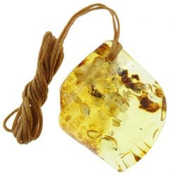 Figured pendant made of translucent amber